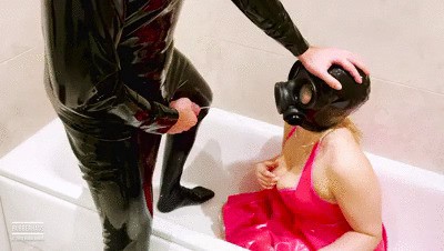 Dirty latex girl as urinal for cock