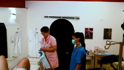 Anal examination by the young apprentice and the mature head nurse