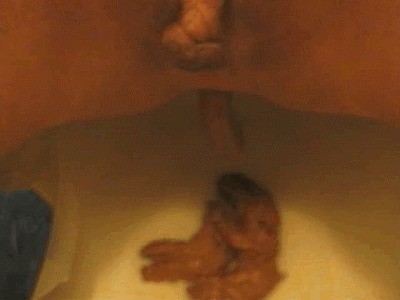Cute amateur babe shitting in the toilet