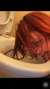 Toilet slut licks dirty public toilet, shoes, floor with a clamp on tongue