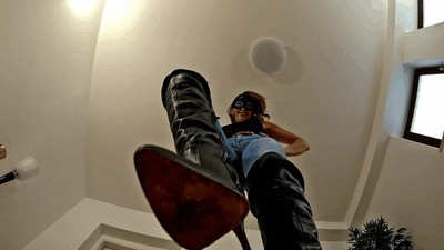 Tiny boot slave crushed under boots (small version)