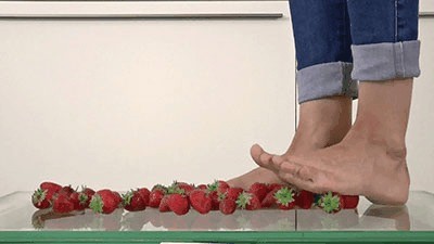 Crushing strawberries on the glass floor