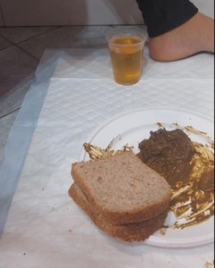 Shit hamburger and a glass of piss